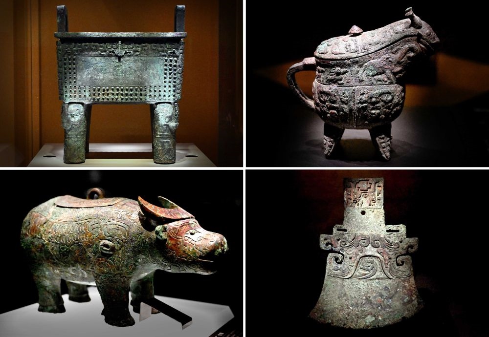這是殷墟博物館新館內展出的“司母辛”銅鼎（左上）、“亞長”銅?。ㄓ疑希ⅰ皝嗛L”牛尊（左下）、“亞長”銅鉞（拼版照片，2月23日攝）。