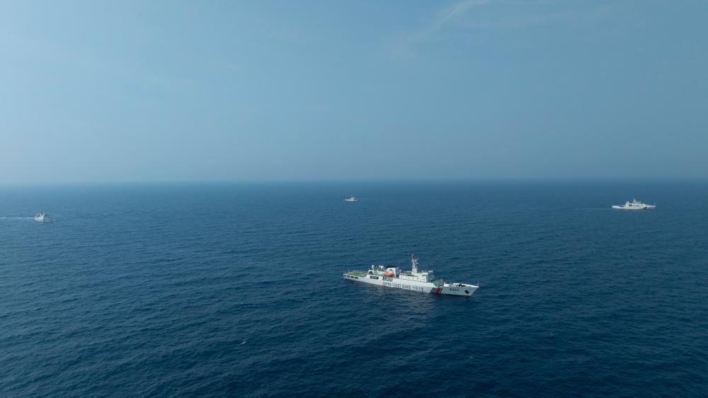 4月22日，中越海警艦艇編隊在北部灣海域開展聯(lián)合巡邏。（中國海警供圖）